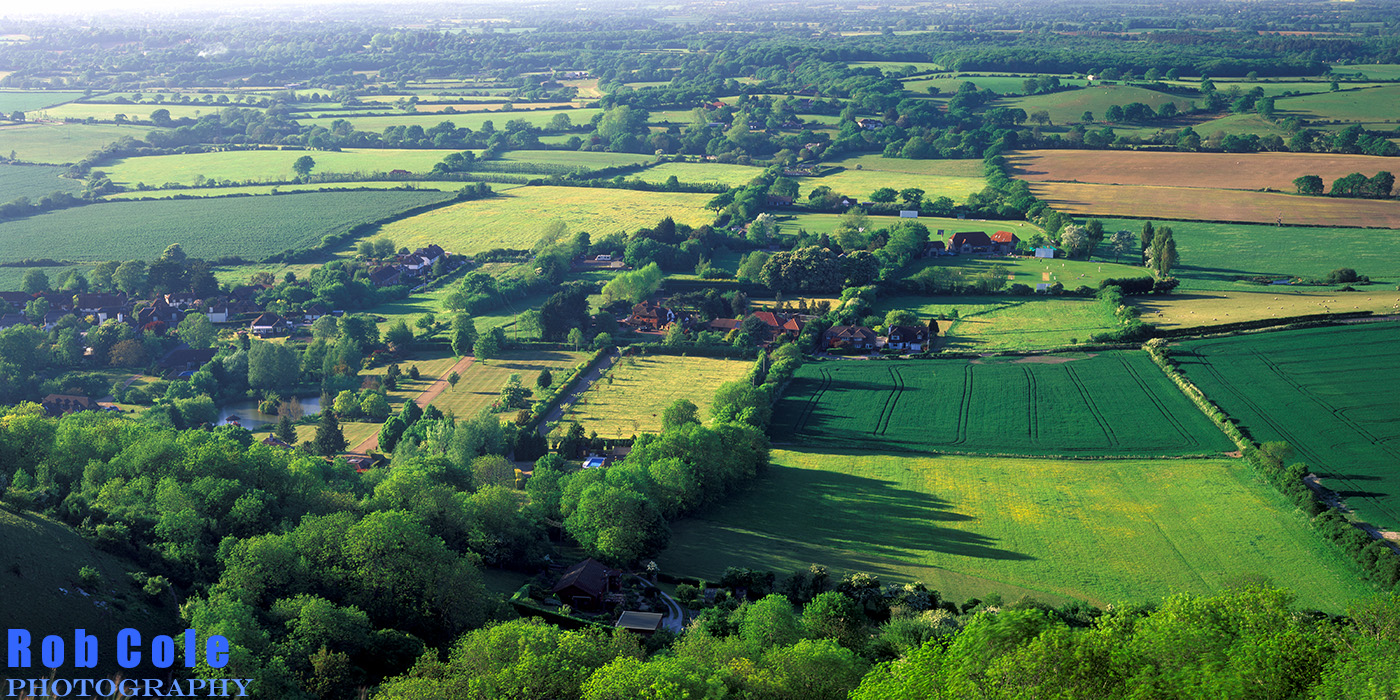 A view of Fulking from the escarpment in summer evening light