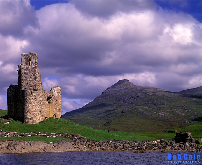 Ardvreck Castle and Quinag shortly after a summer sunrise