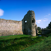 The Gatehouse and moat of Pevensey Castle in East Sussex